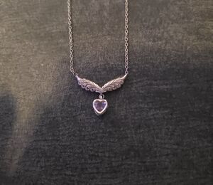 Elegant Silver Winged Amethyst Heart Necklace.